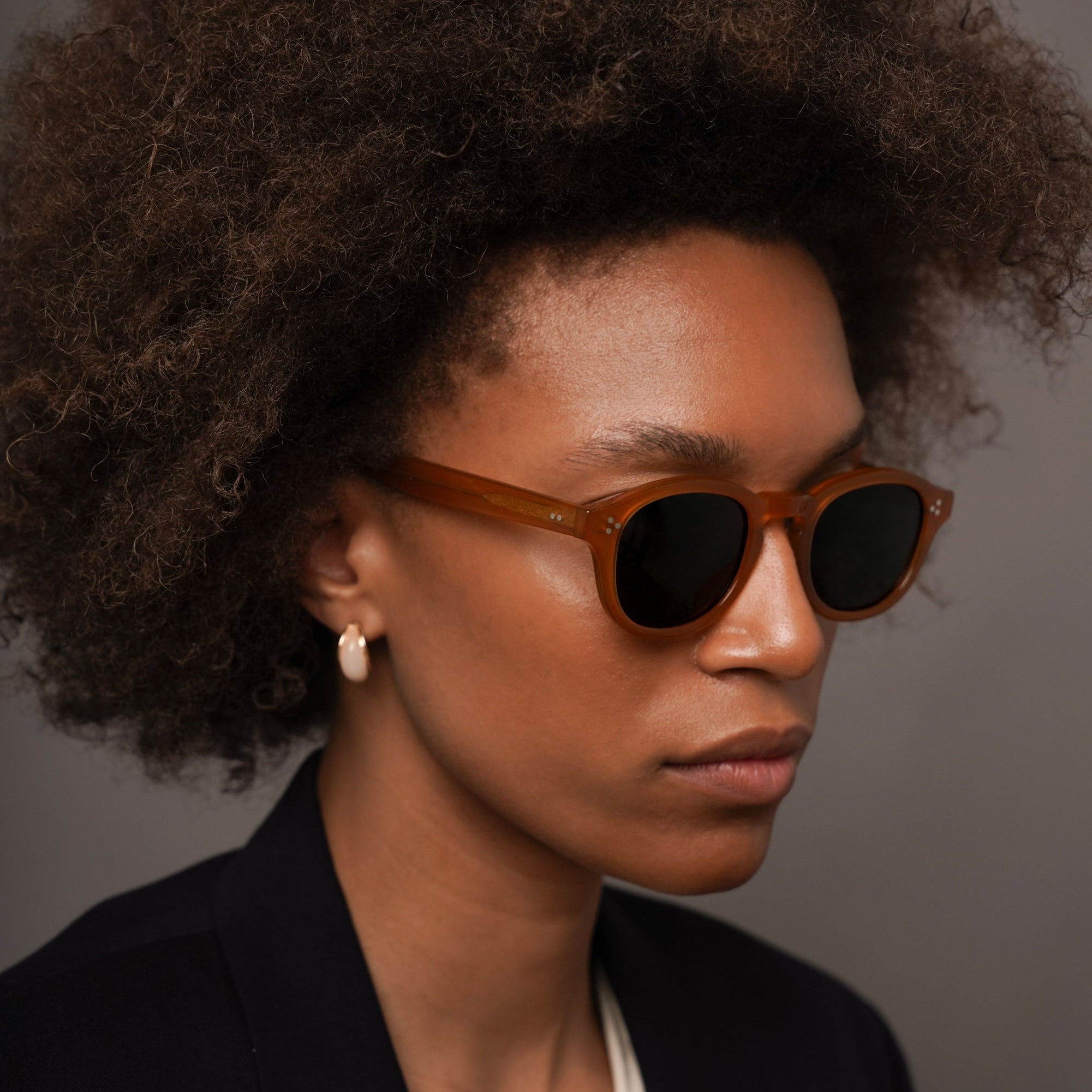 The Evans Amber Sunglasses, Mazzucchelli 1849 acetate frame, round shape, in amber.