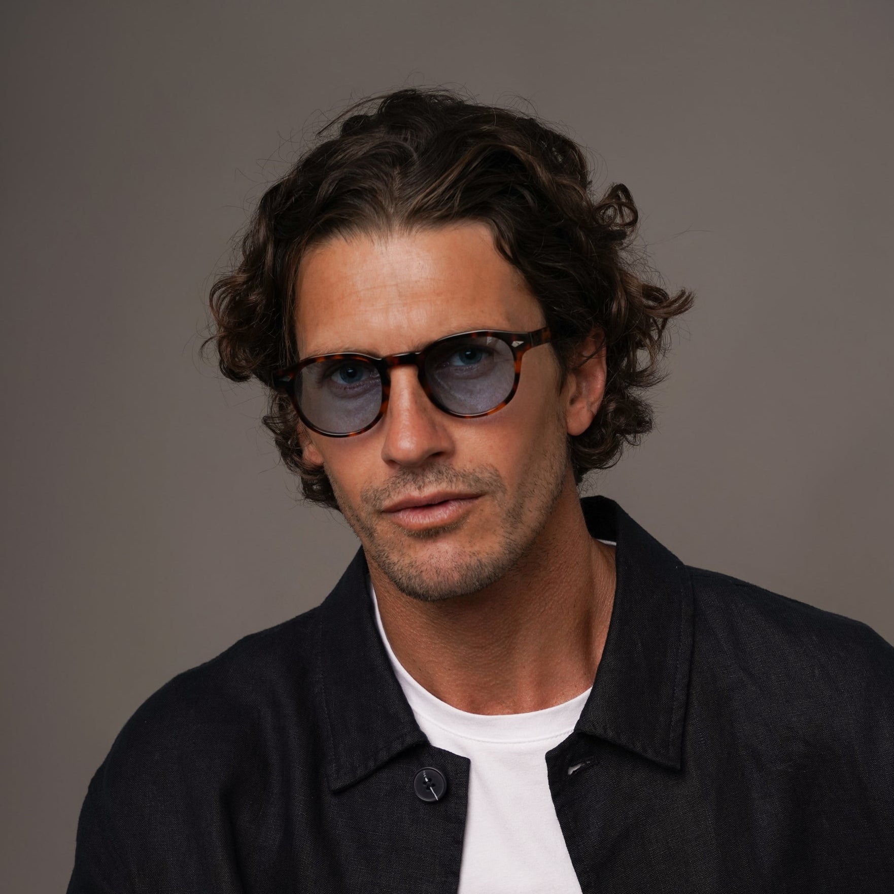 The Basquiat Bon Vivant, Mazzucchelli 1849 acetate frame, rounded square shape, tortoise with blue-tinted lenses.