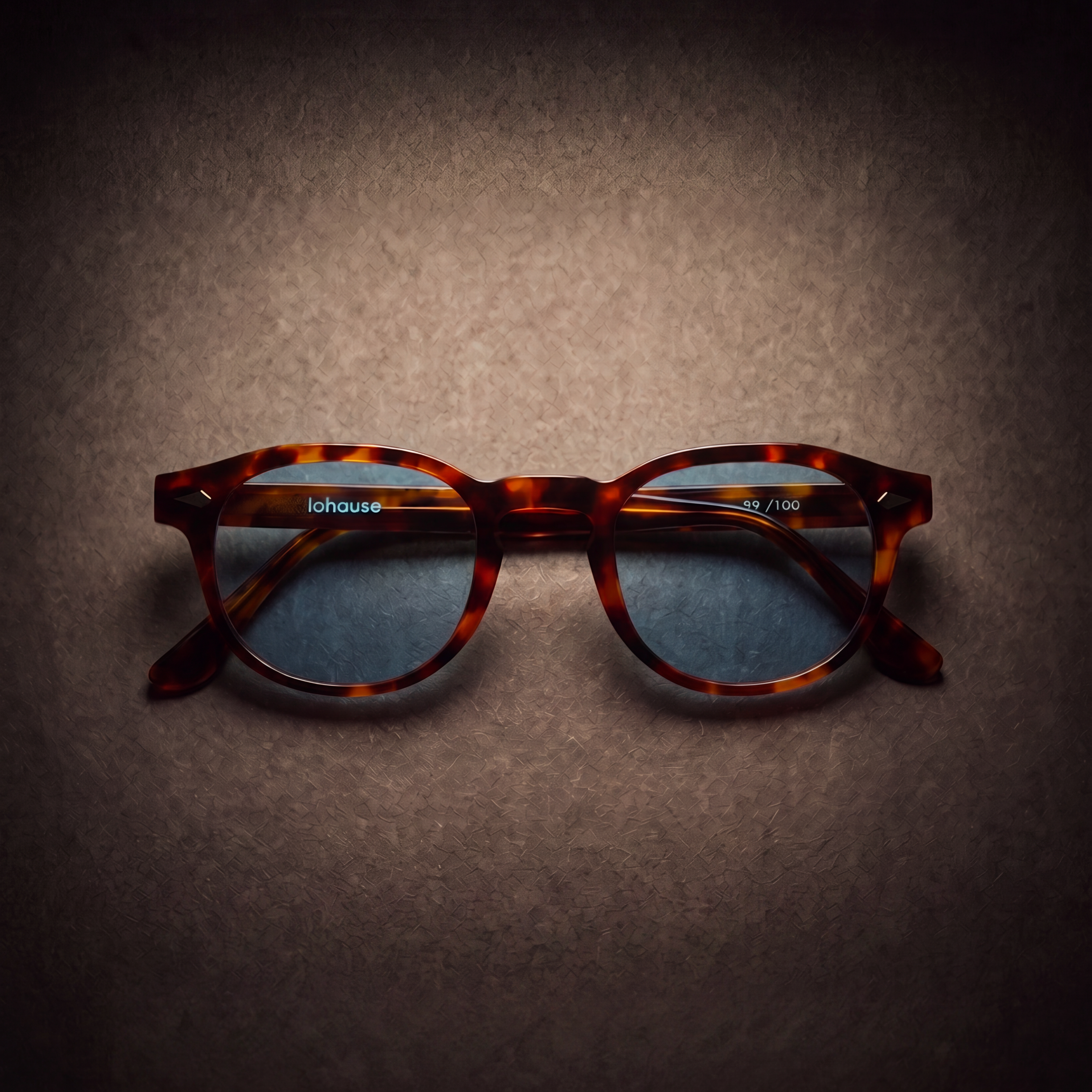 The Basquiat Bon Vivant, Mazzucchelli 1849 acetate frame, rounded square shape, tortoise with blue-tinted lenses.