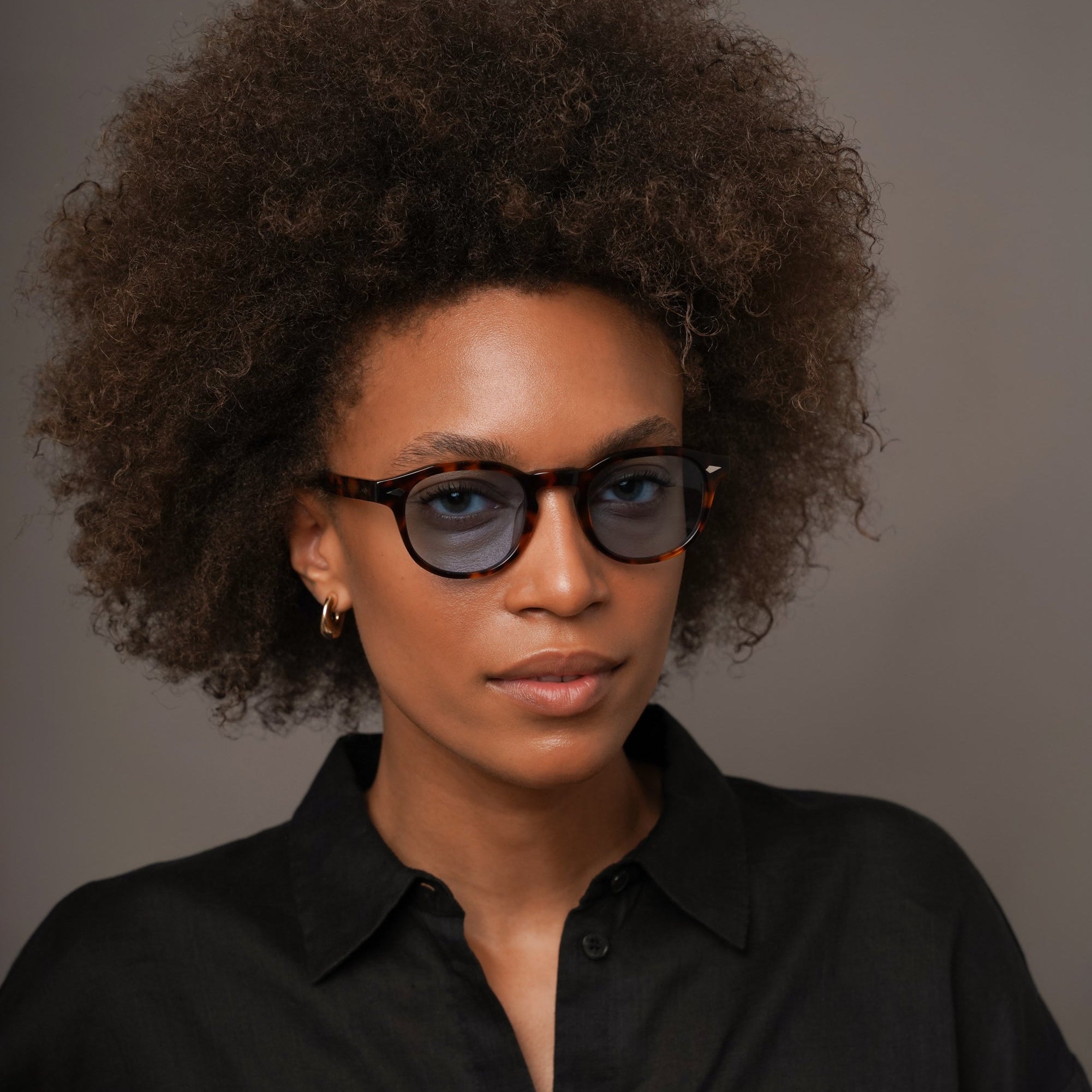 The Basquiat Bon Vivant, Mazzucchelli 1849 acetate frame, rounded square shape, tortoise with blue-tinted lenses.