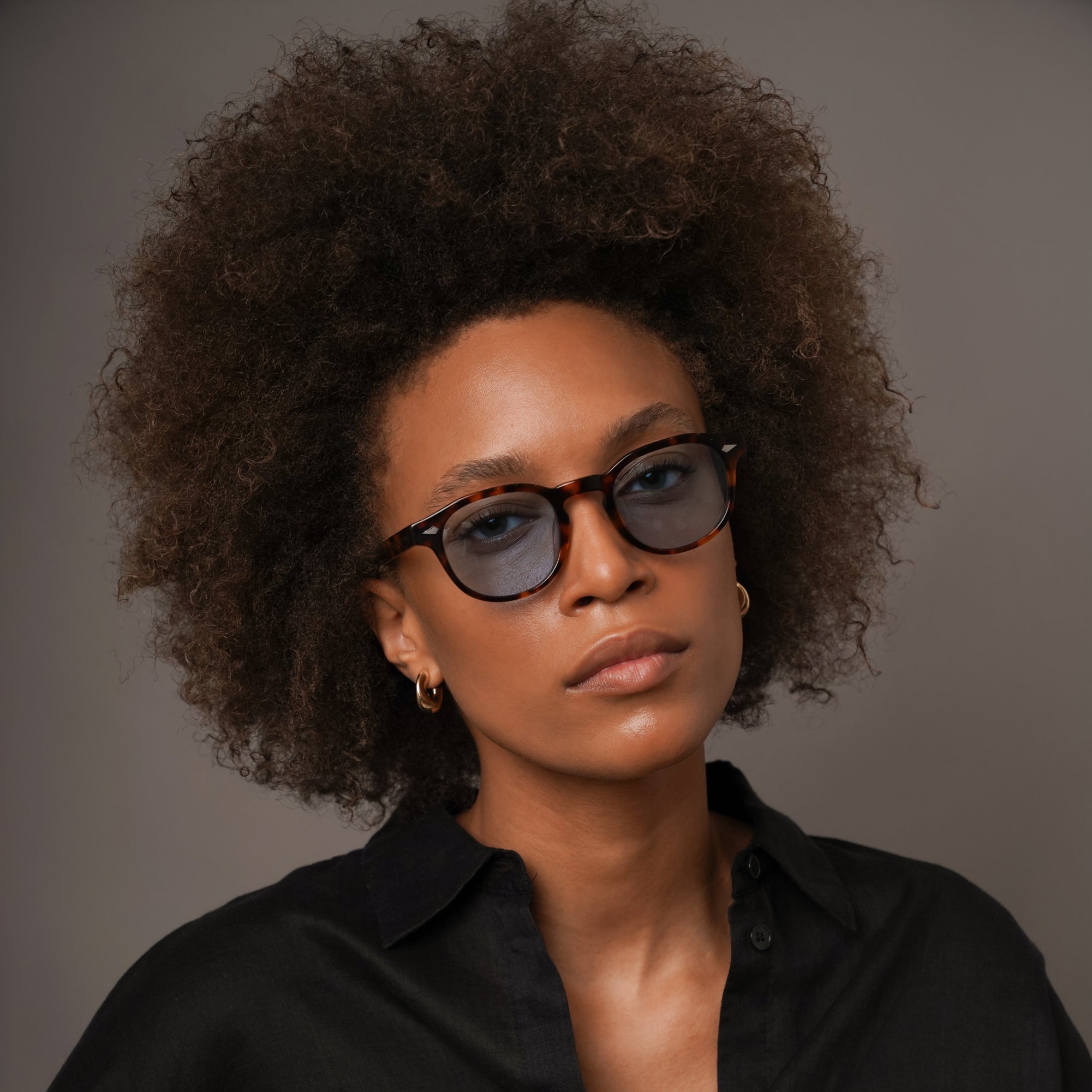 The Basquiat Bon Vivant, Mazzucchelli 1849 acetate frame, rounded square shape, tortoise with blue-tinted lenses.