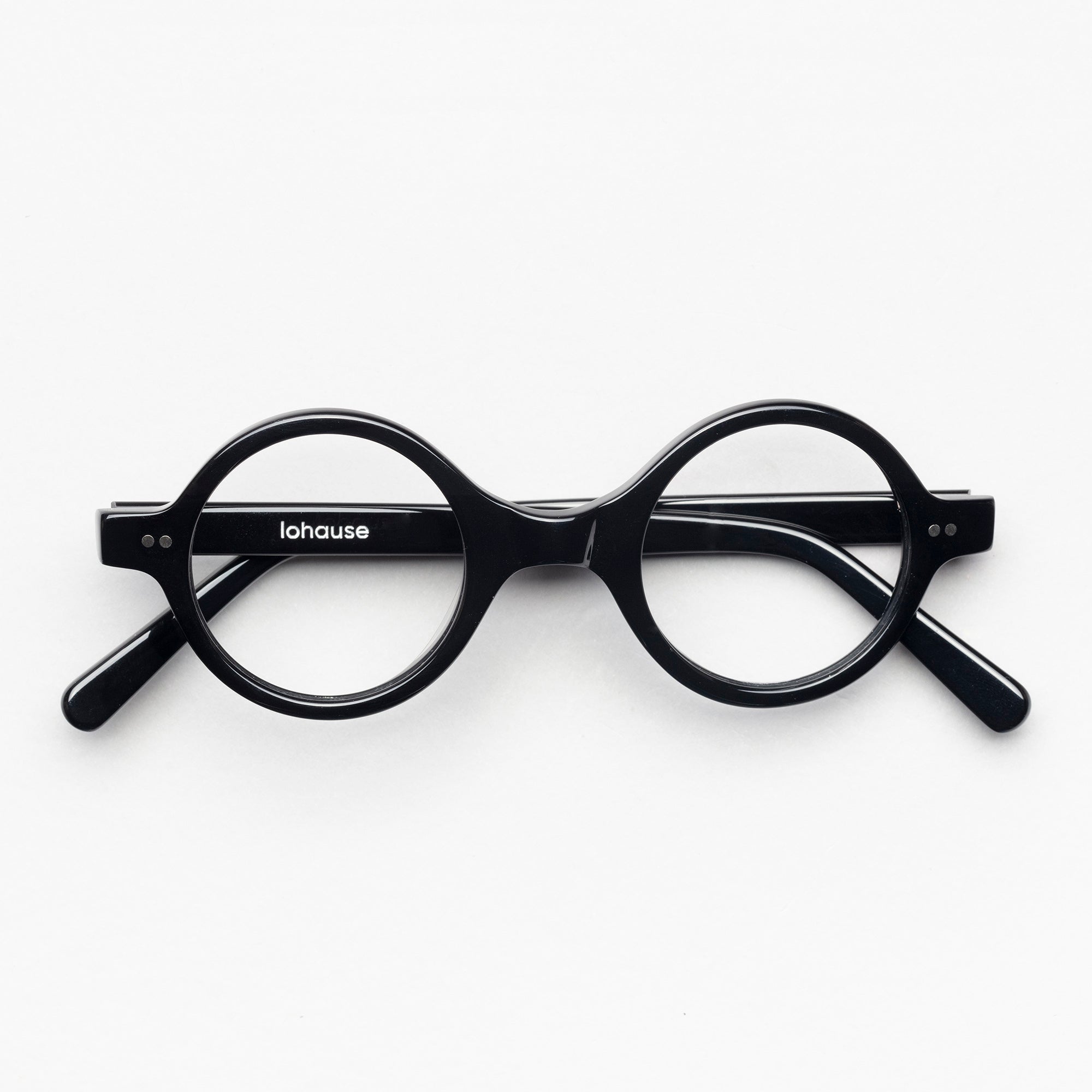 The Corbusier Noir — eyeglasses, Mazzucchelli 1849 acetate frame, round shape, in black.