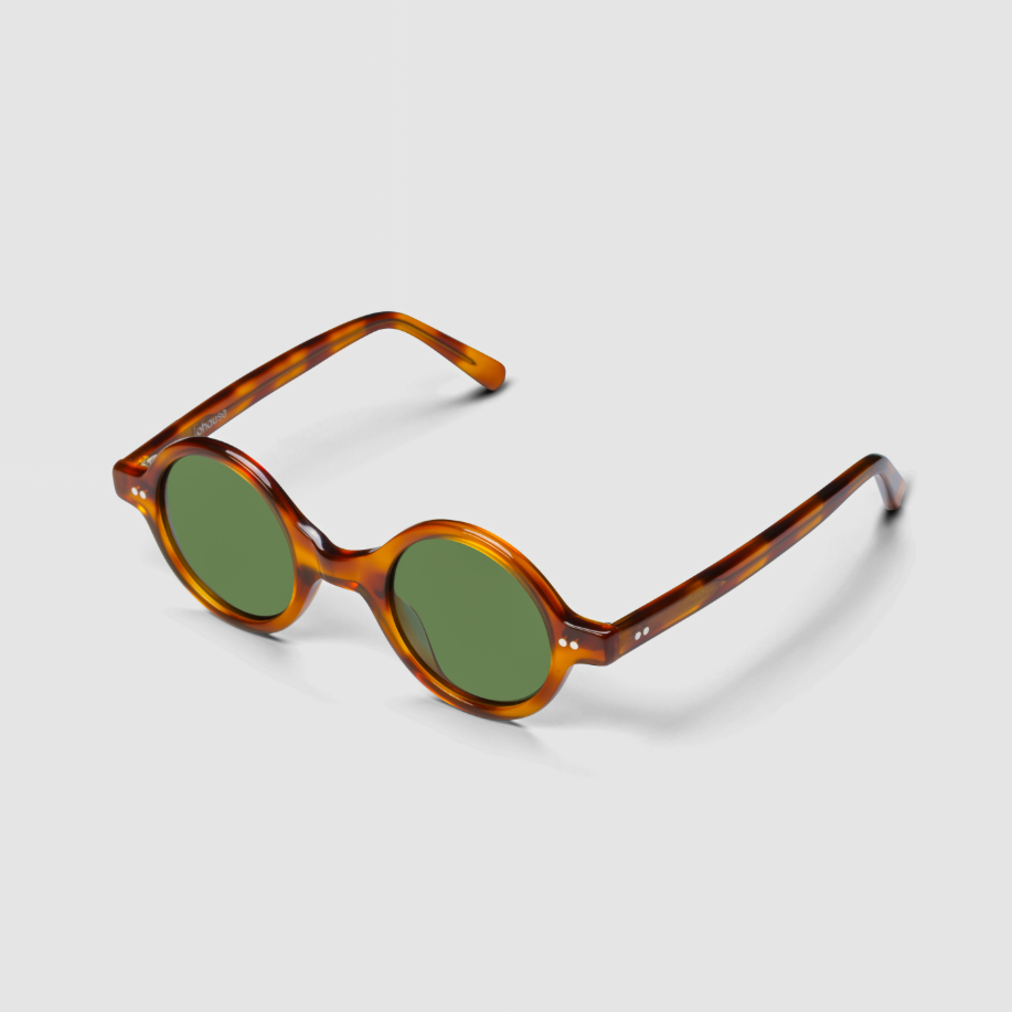 The Corbusier Scotch Sunglasses, Mazzucchelli 1849 acetate frame, round shape, in whisky amber.
