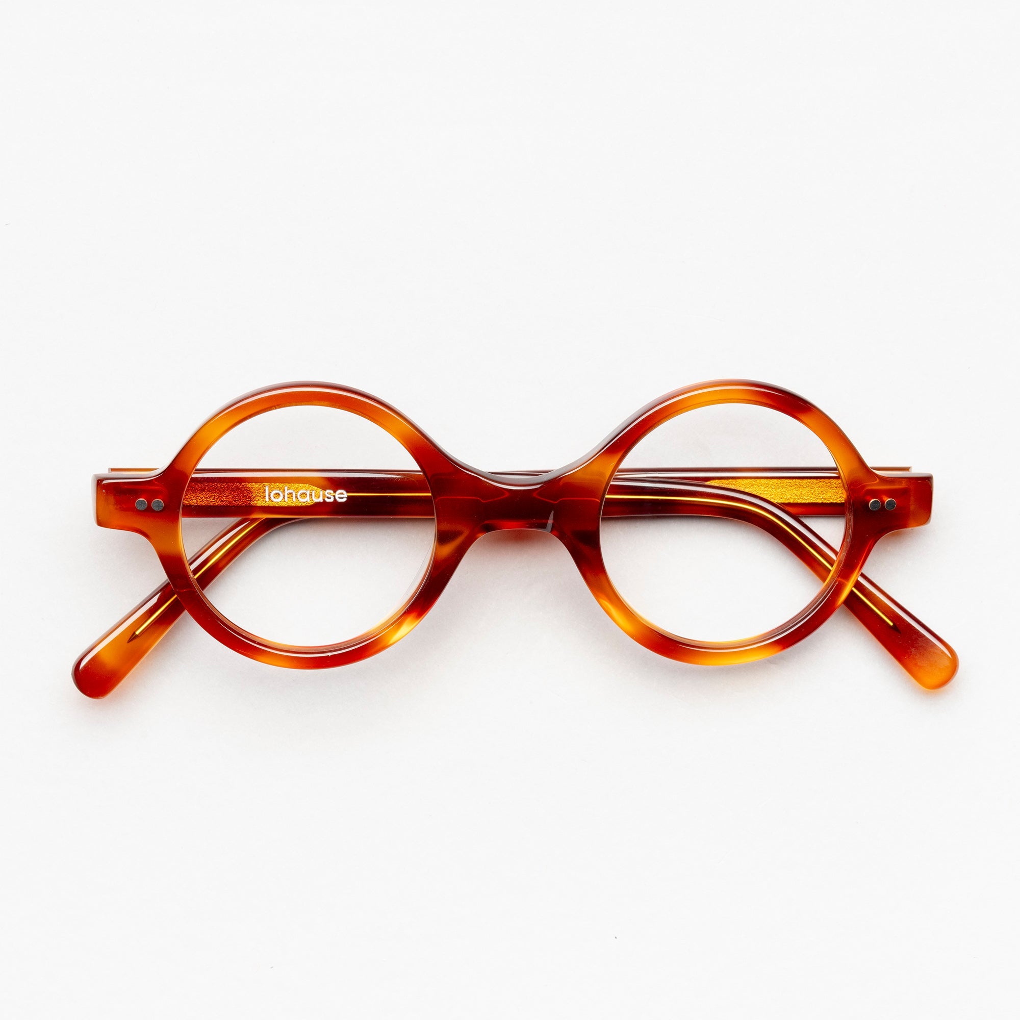 The Corbusier Scotch — eyeglasses, Mazzucchelli 1849 acetate frame, round shape, in whisky amber.