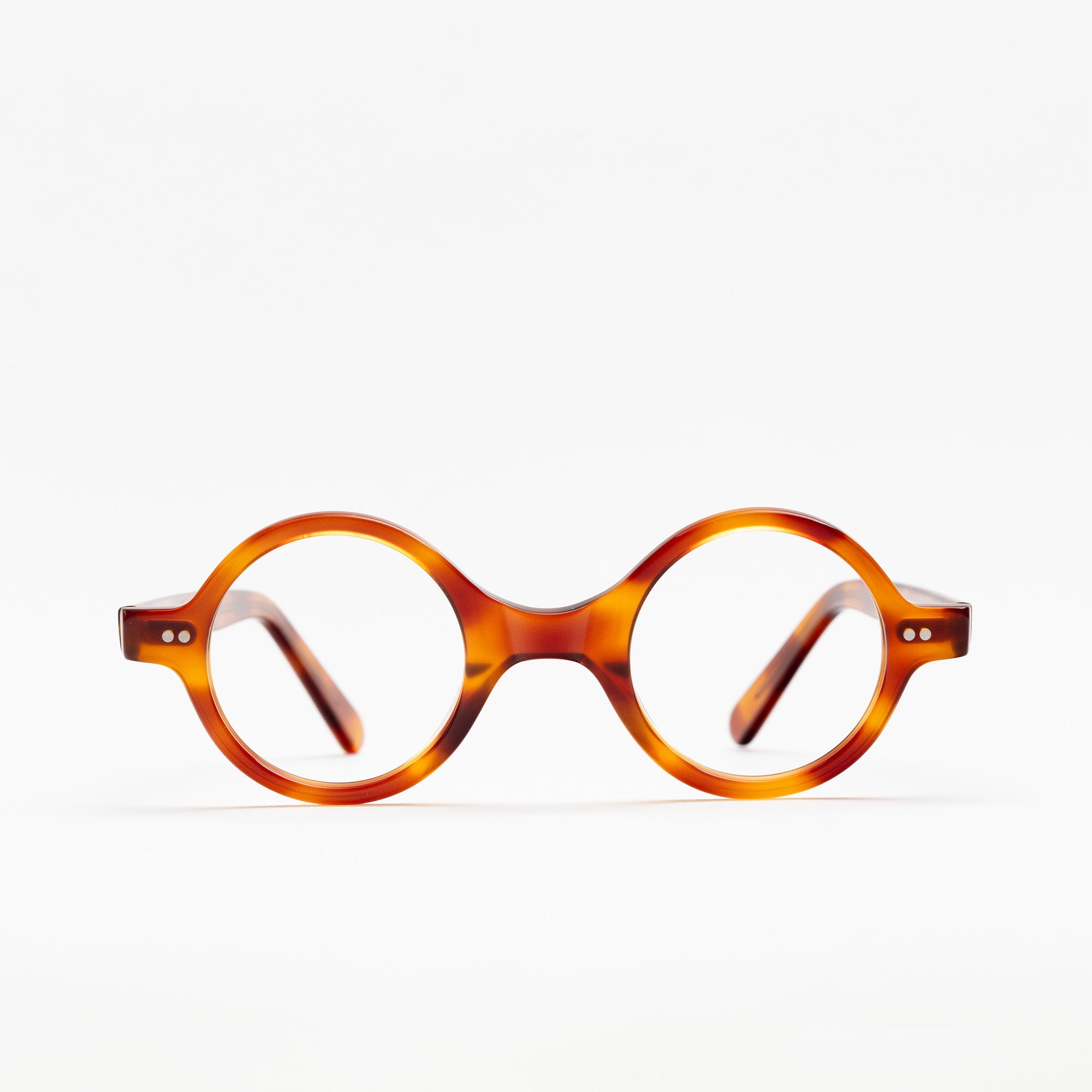 The Corbusier Scotch — eyeglasses, Mazzucchelli 1849 acetate frame, round shape, in whisky amber.
