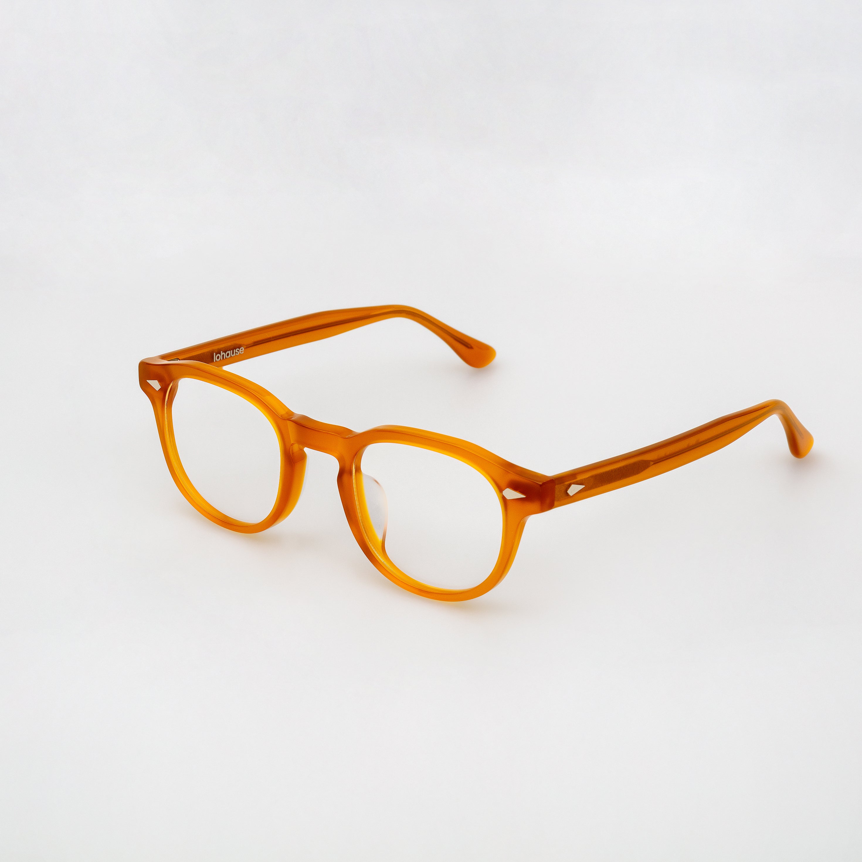 The Basquiat Amber — eyeglasses, Mazzucchelli 1849 acetate frame, rounded square shape, in amber.