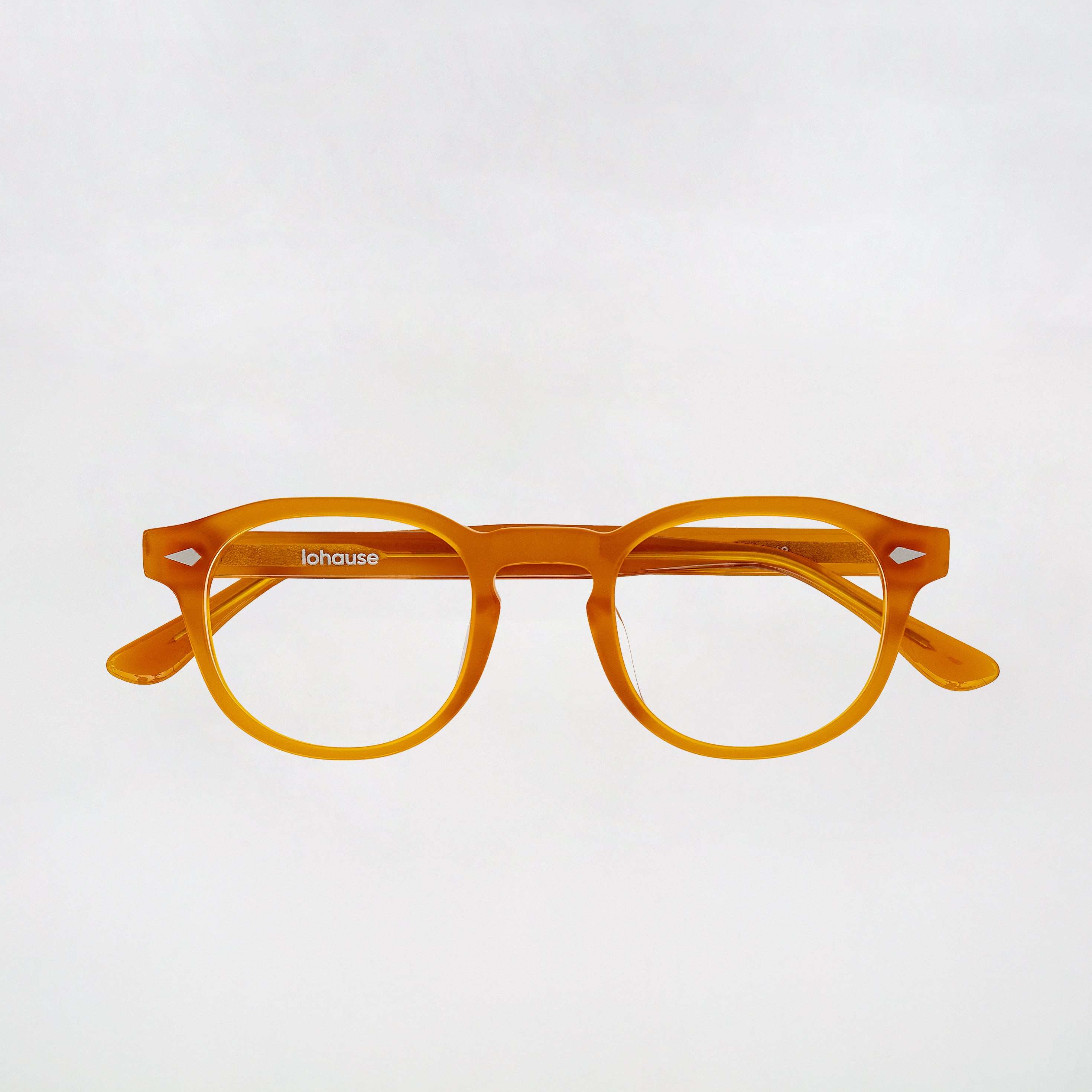 The Basquiat Amber — eyeglasses, Mazzucchelli 1849 acetate frame, rounded square shape, in amber.