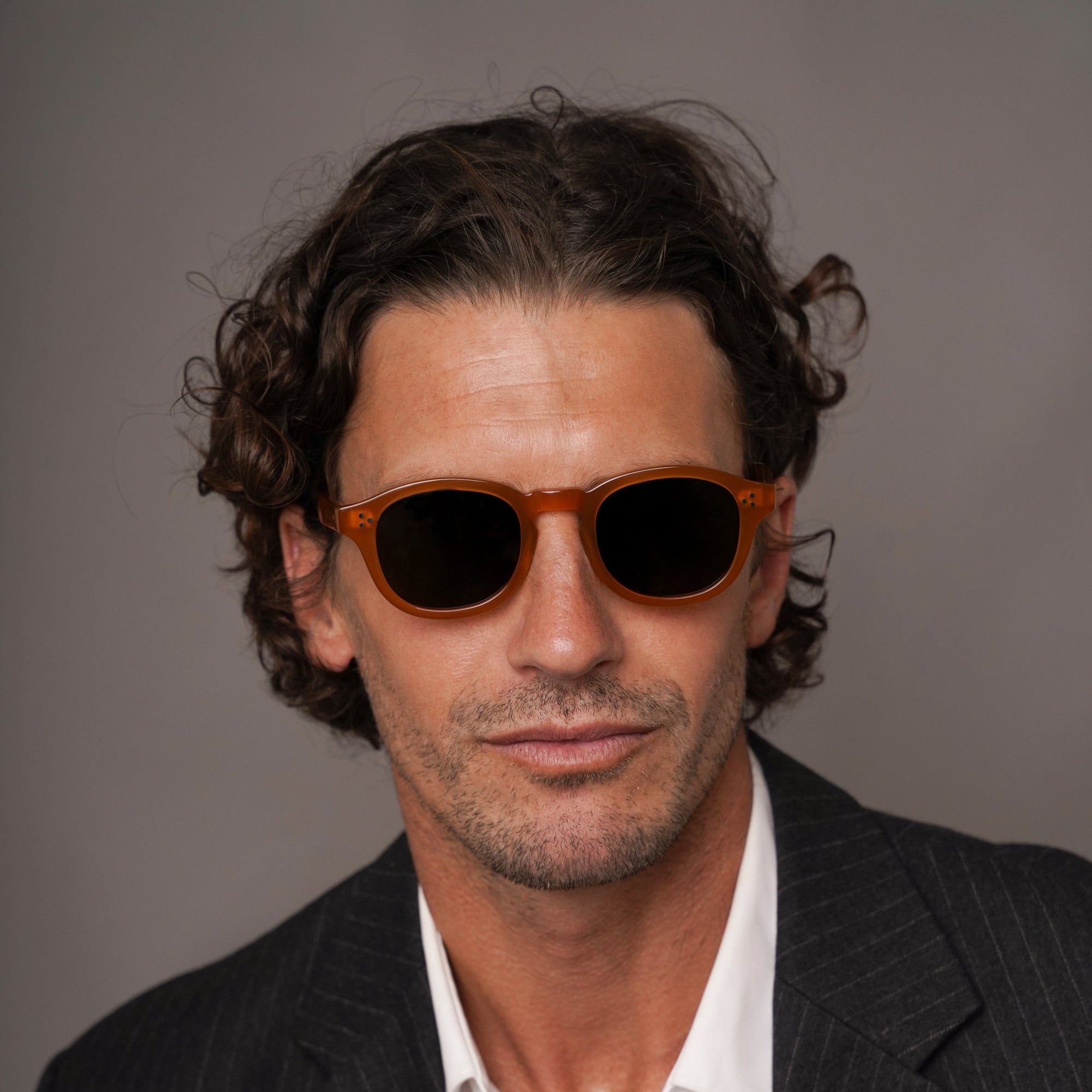 The Evans Amber Sunglasses, Mazzucchelli 1849 acetate frame, round shape, in amber.