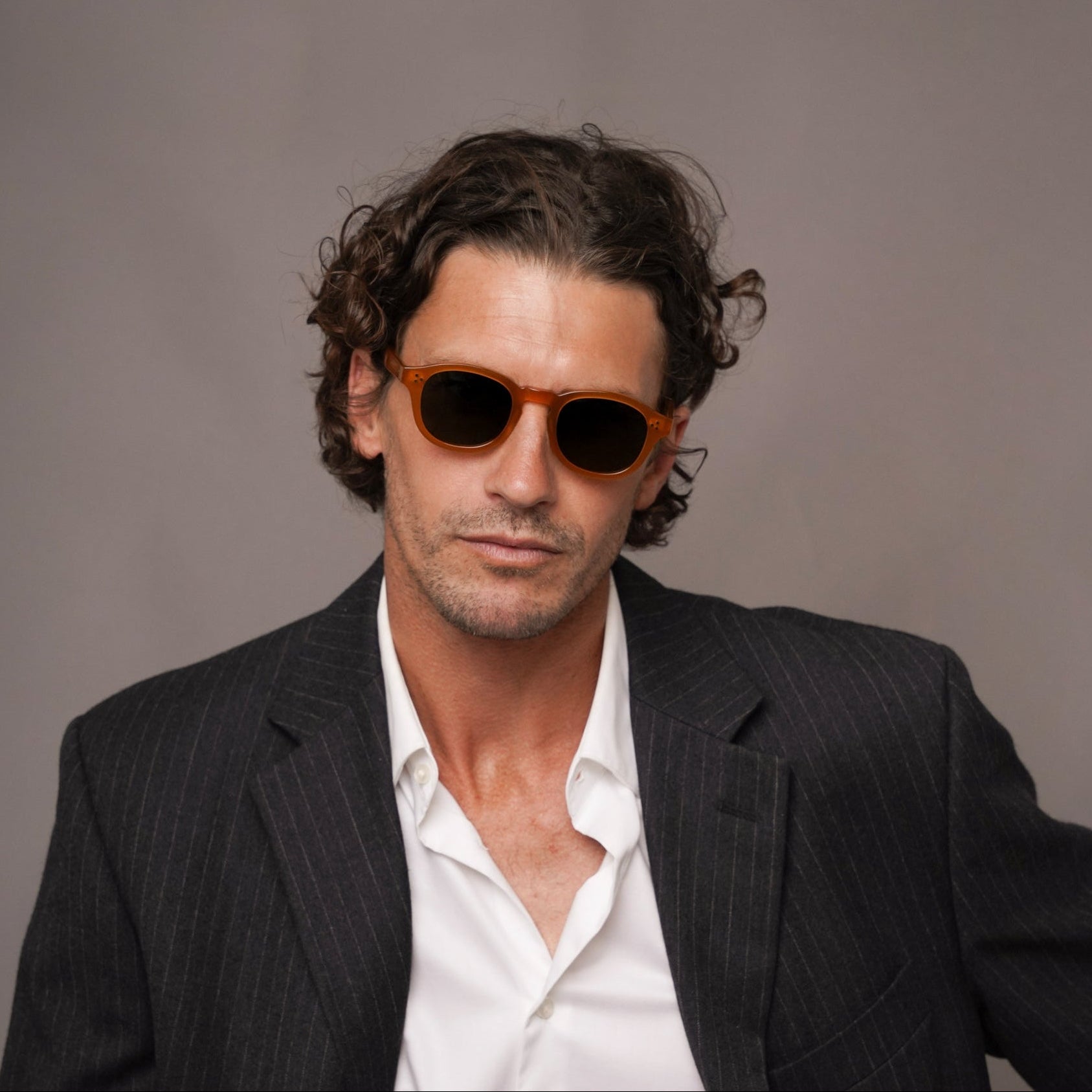 The Evans Amber Sunglasses, Mazzucchelli 1849 acetate frame, round shape, in amber.