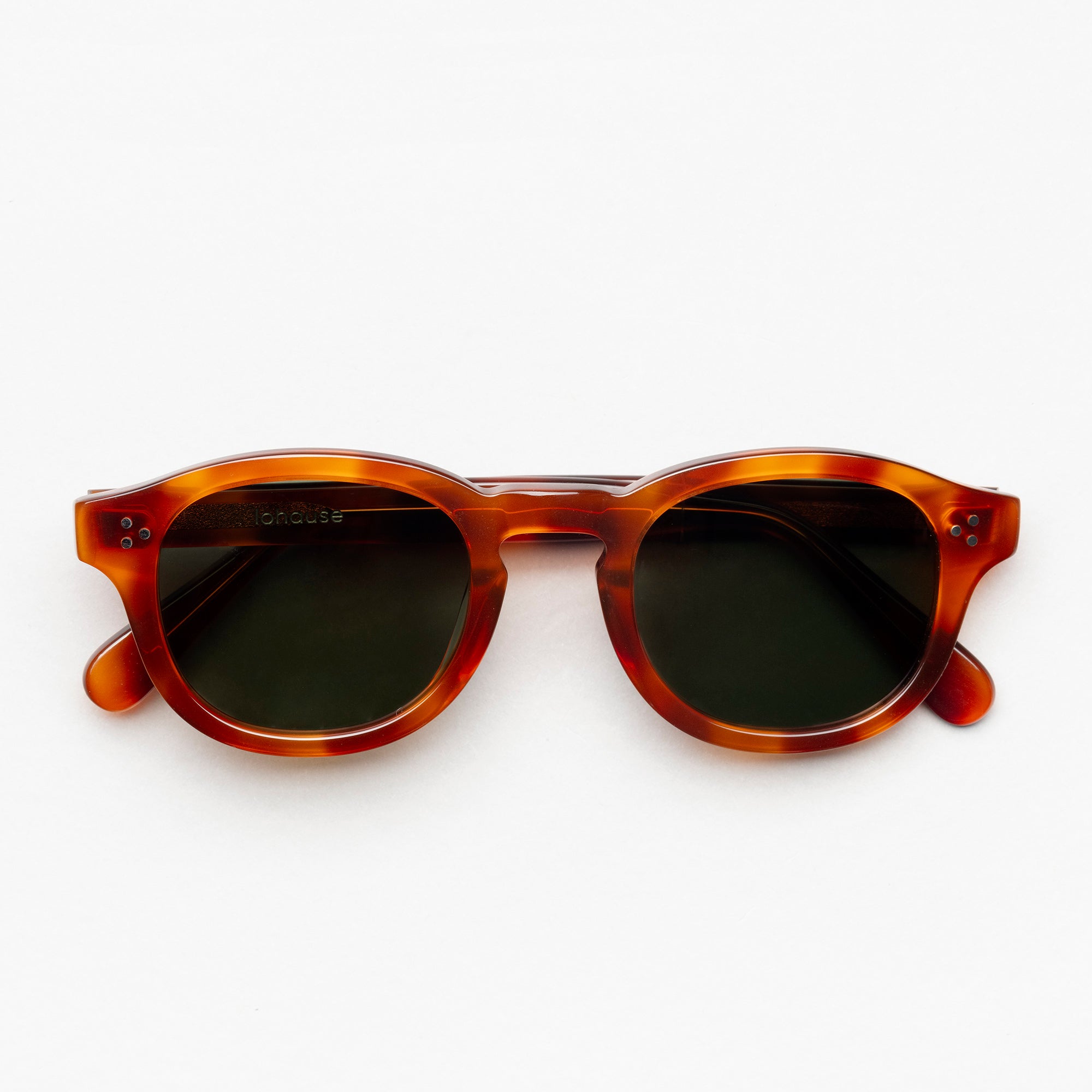The Evans Scotch Sunglasses, Mazzucchelli 1849 acetate frame, round shape, in whisky amber.