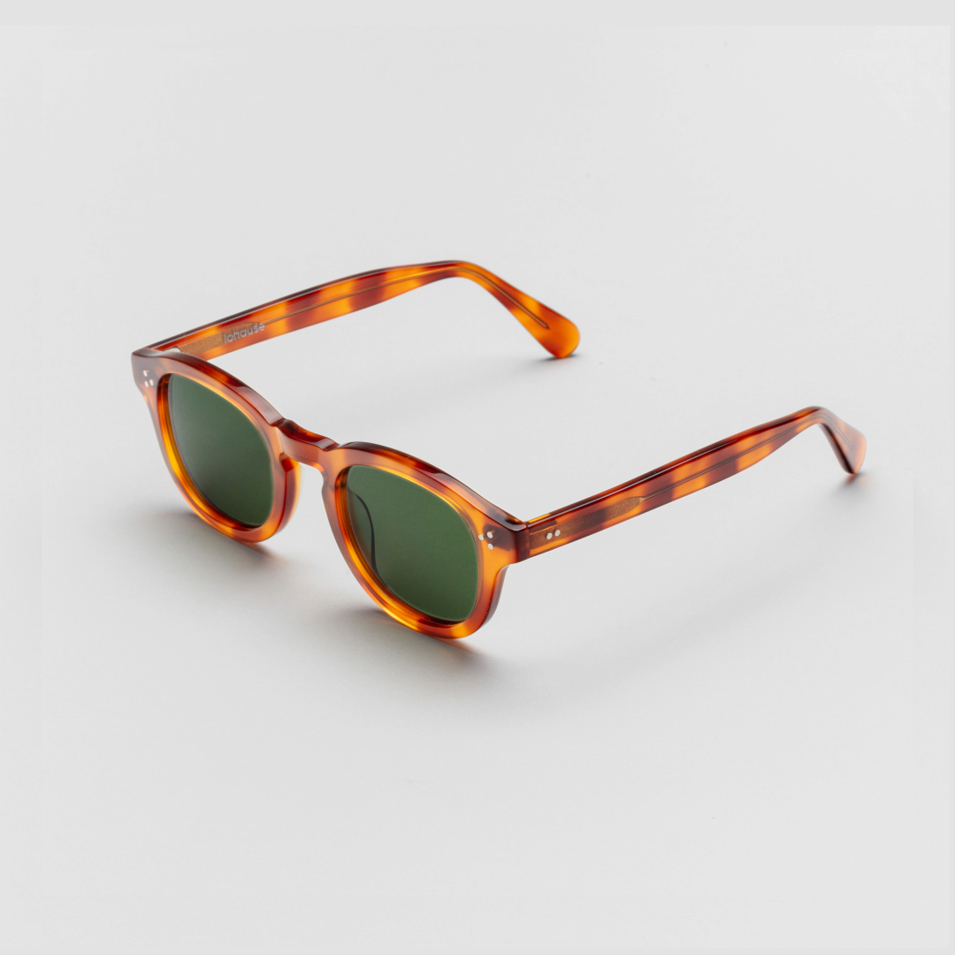 The Evans Scotch Sunglasses, Mazzucchelli 1849 acetate frame, round shape, in whisky amber.
