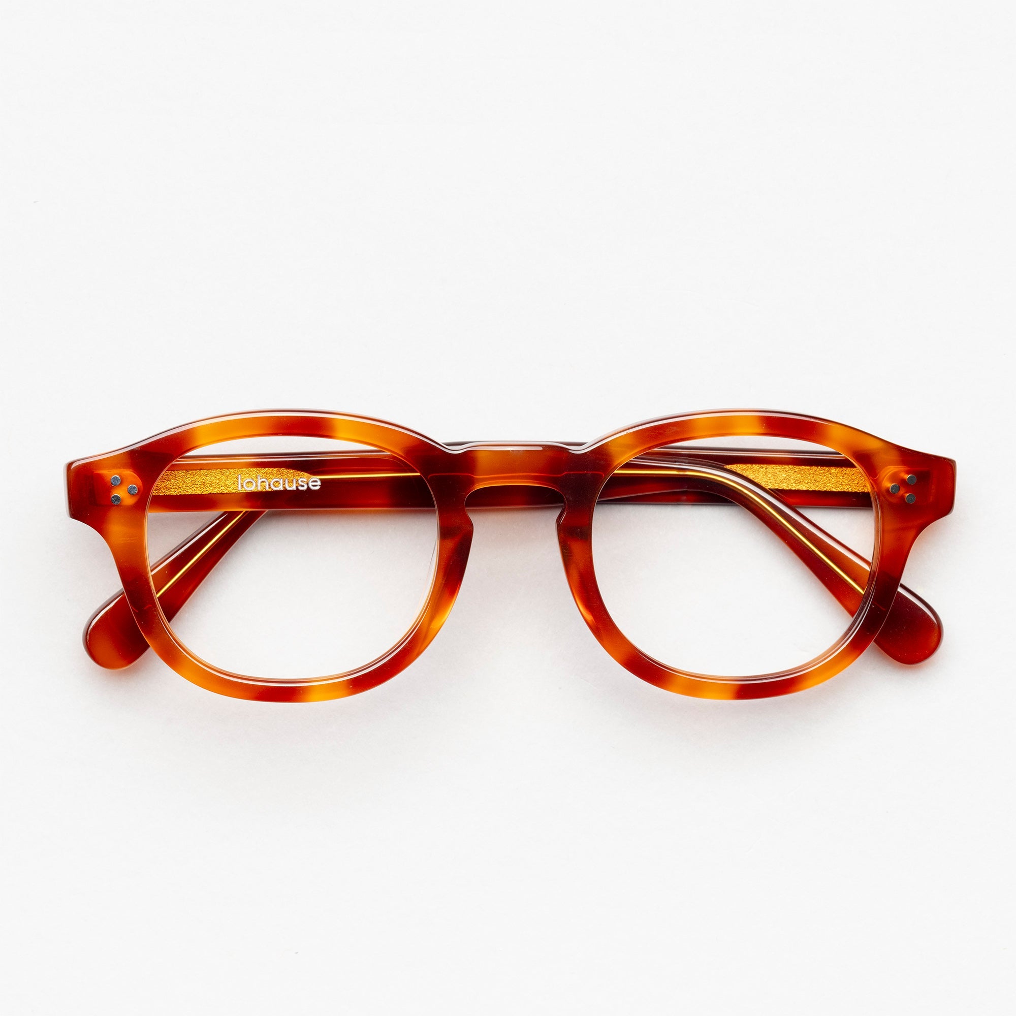 The Evans Scotch — eyeglasses, Mazzucchelli 1849 acetate frame, round shape, in whisky amber.