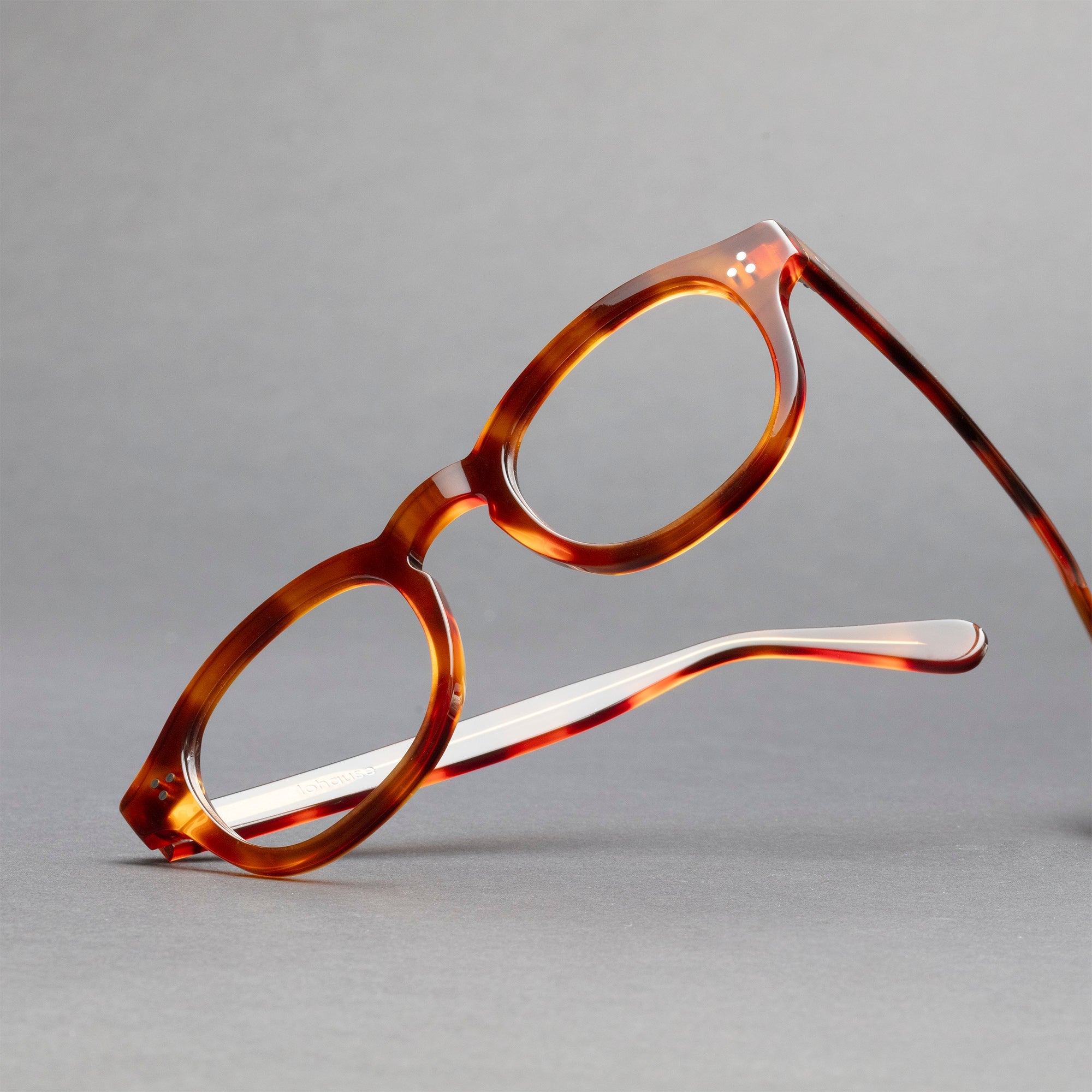 The Evans Scotch — eyeglasses, Mazzucchelli 1849 acetate frame, round shape, in whisky amber.