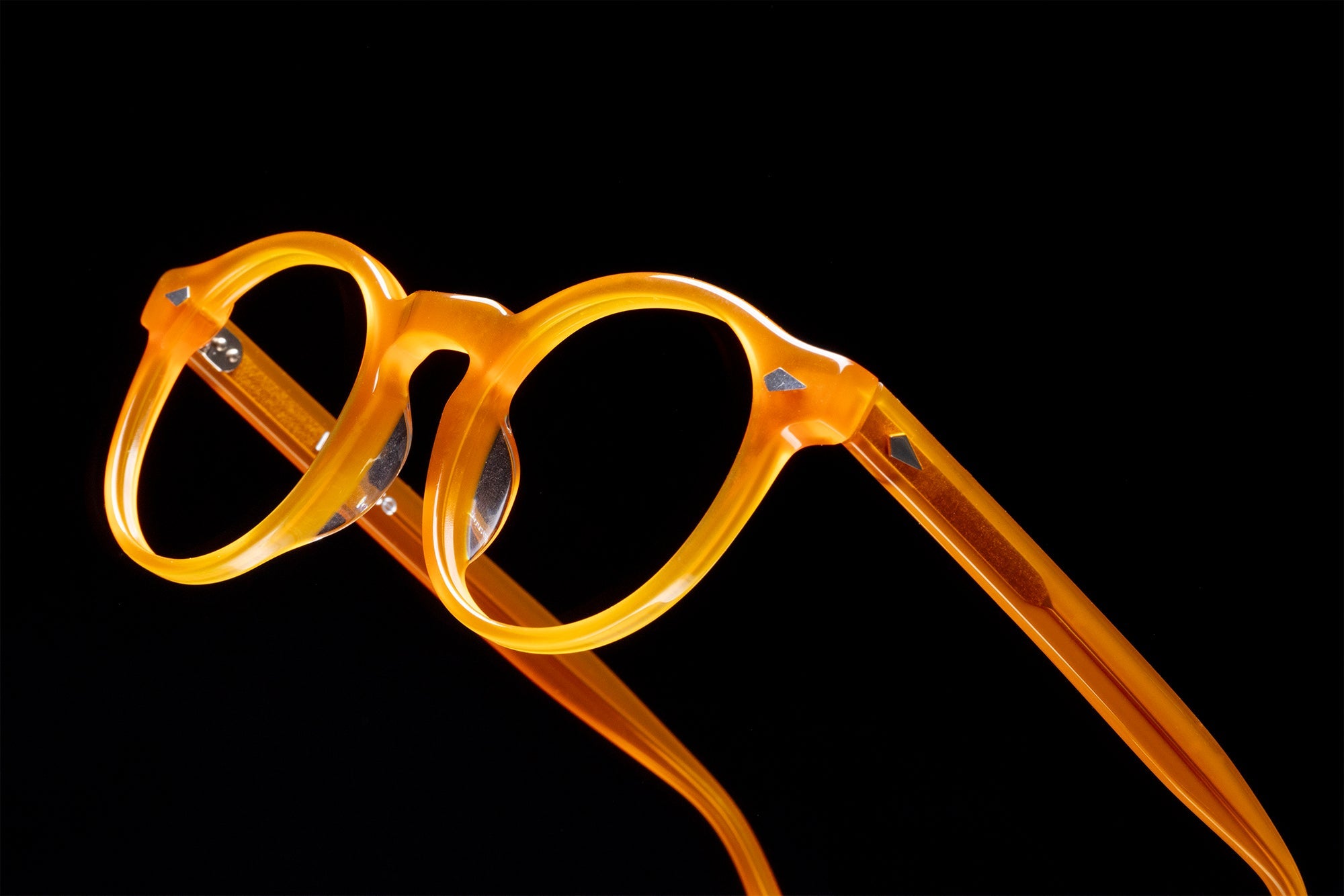 The Picasso Amber — eyeglasses, Mazzucchelli 1849 acetate frame, round shape, in amber.