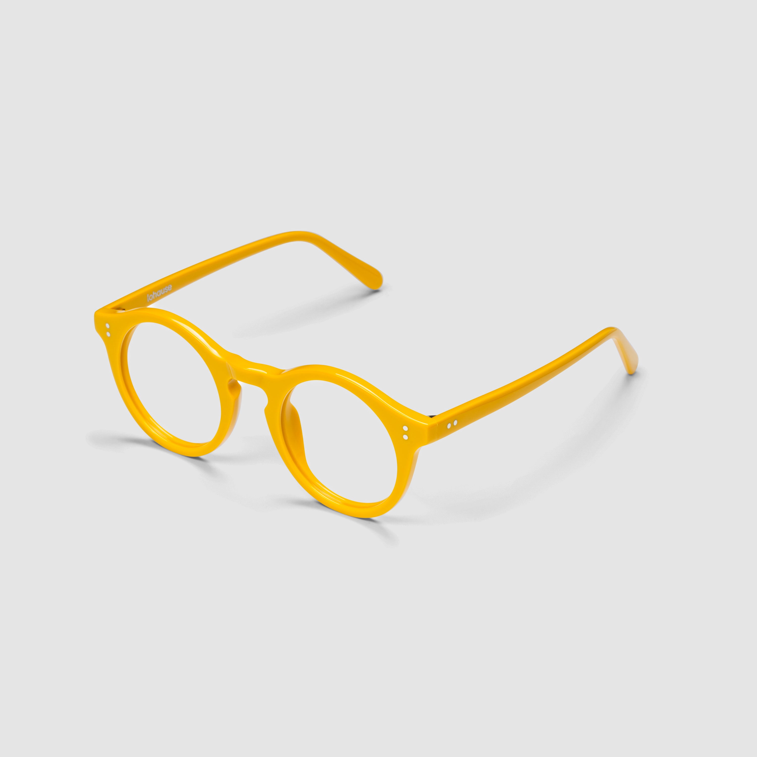 The Spike Amberfort — eyeglasses, Mazzucchelli 1849 acetate frame, round shape, in deep amber.