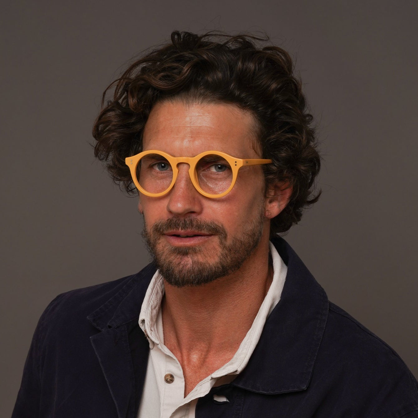 The Spike Amberfort — eyeglasses, Mazzucchelli 1849 acetate frame, round shape, in deep amber.