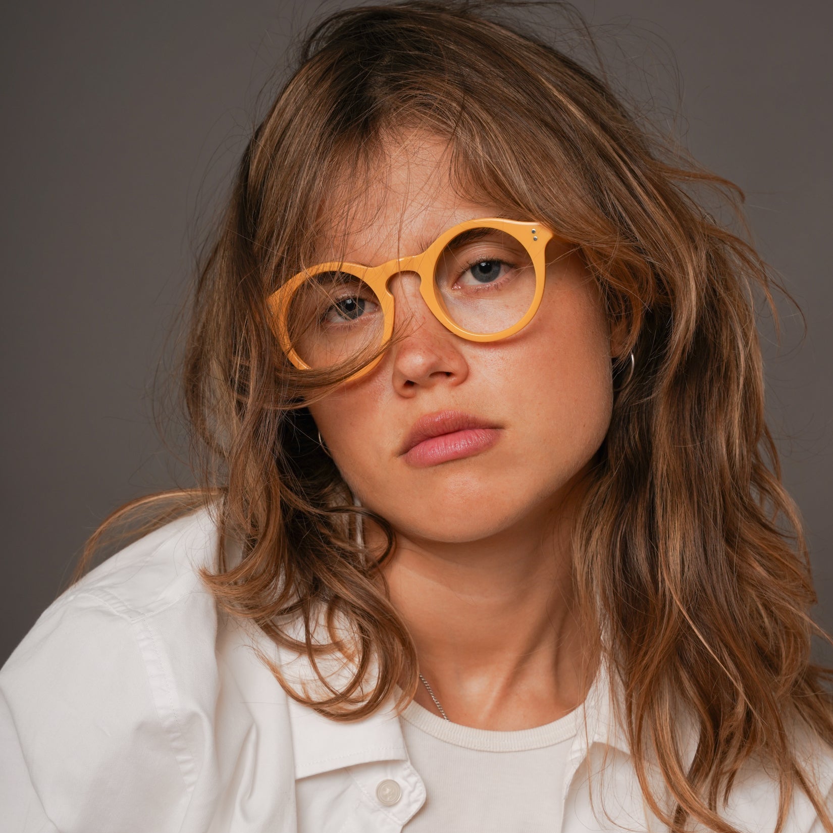 The Spike Amberfort — eyeglasses, Mazzucchelli 1849 acetate frame, round shape, in deep amber.