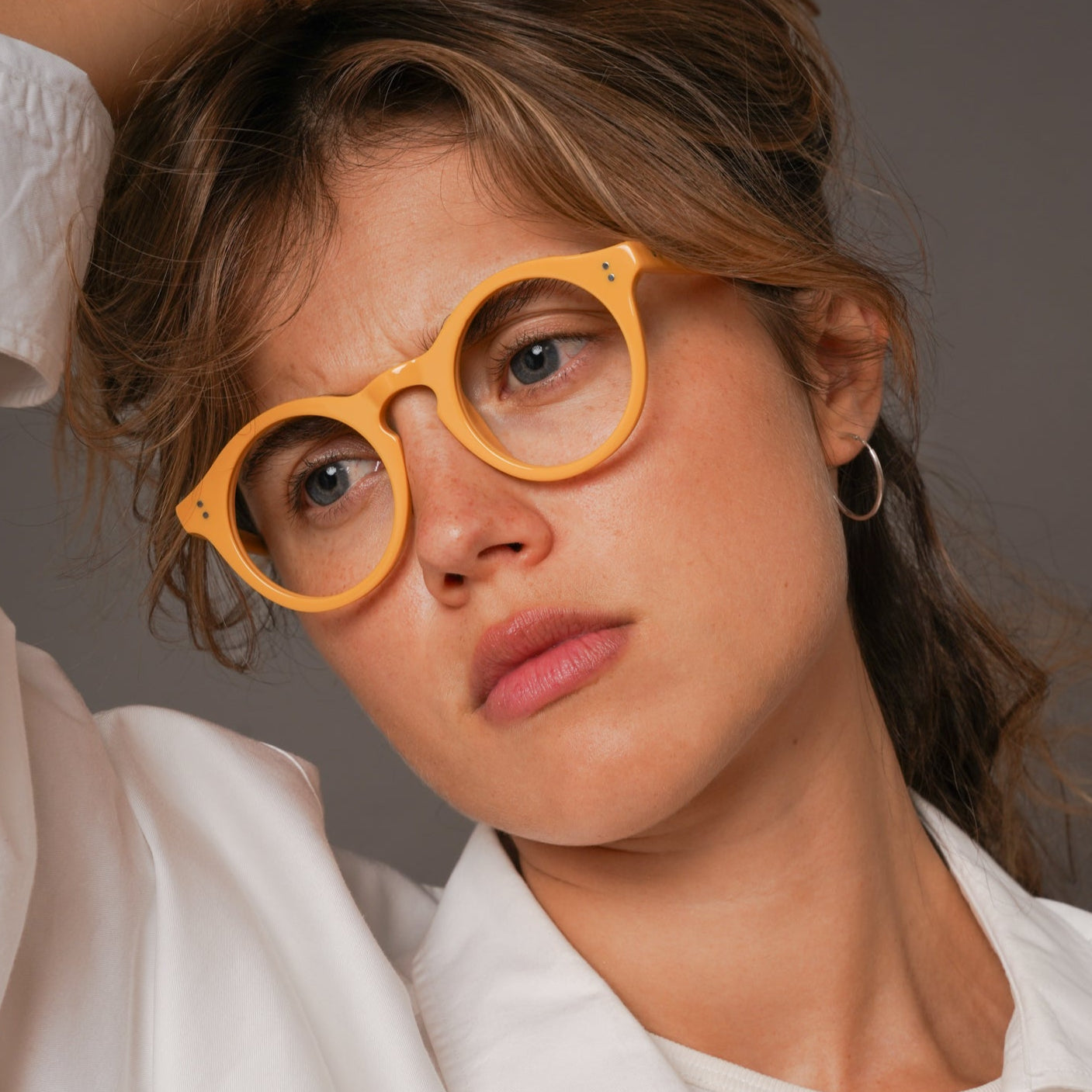 The Spike Amberfort — eyeglasses, Mazzucchelli 1849 acetate frame, round shape, in deep amber.