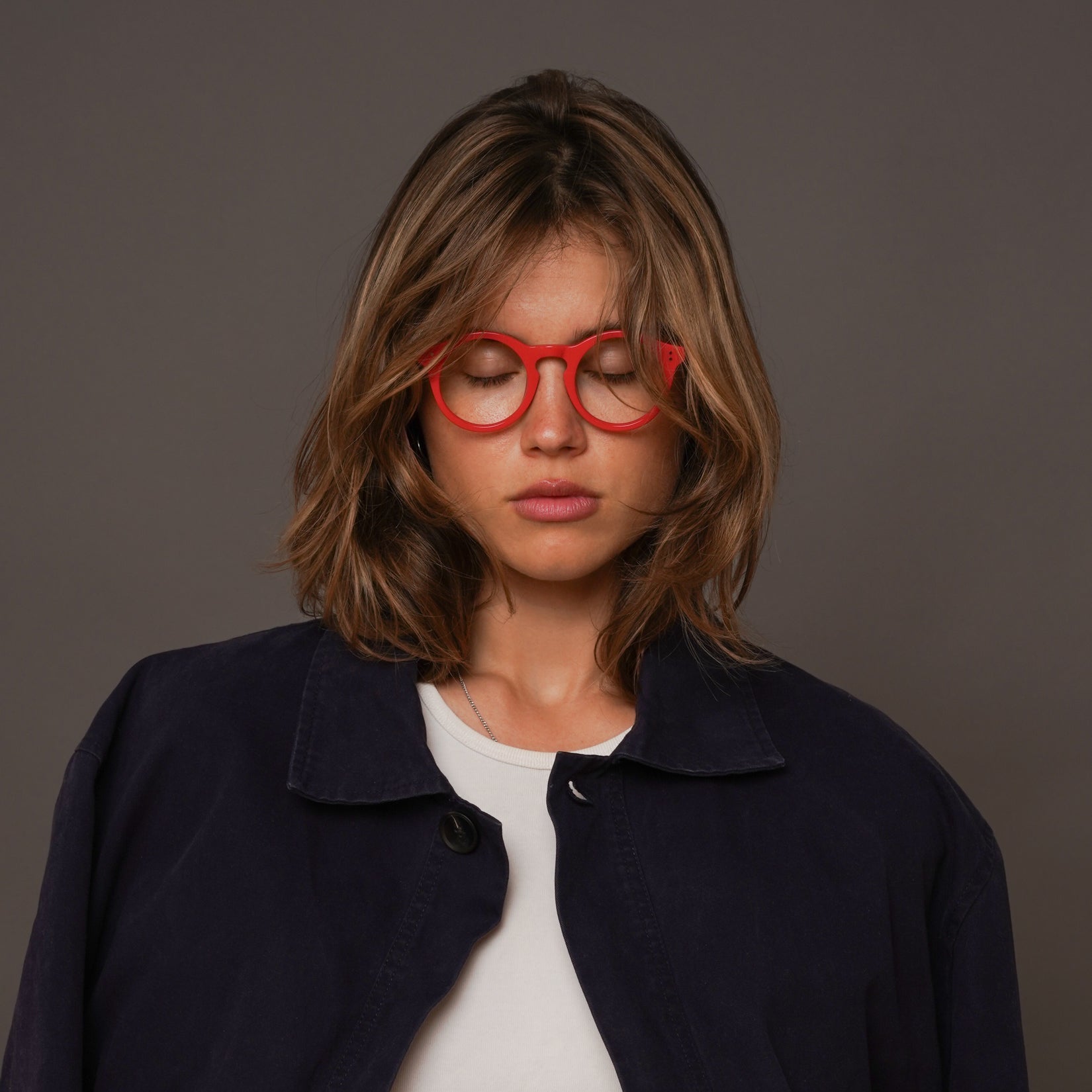 The Spike Carmine — eyeglasses, Mazzucchelli 1849 acetate frame, round shape, in carmine.
