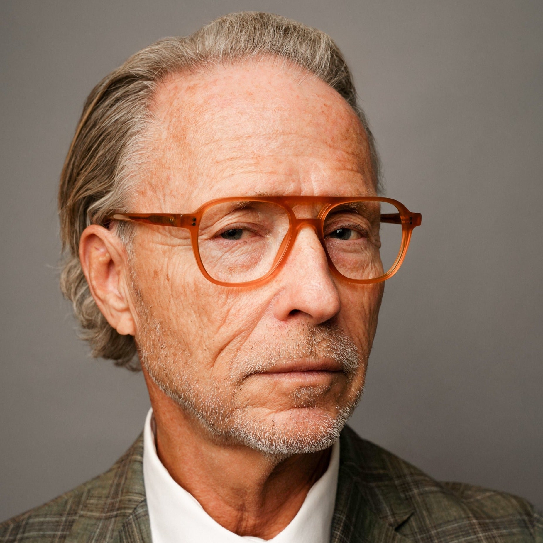 The Truman Amber — eyeglasses, Mazzucchelli 1849 acetate frame, aviator shape, in amber.