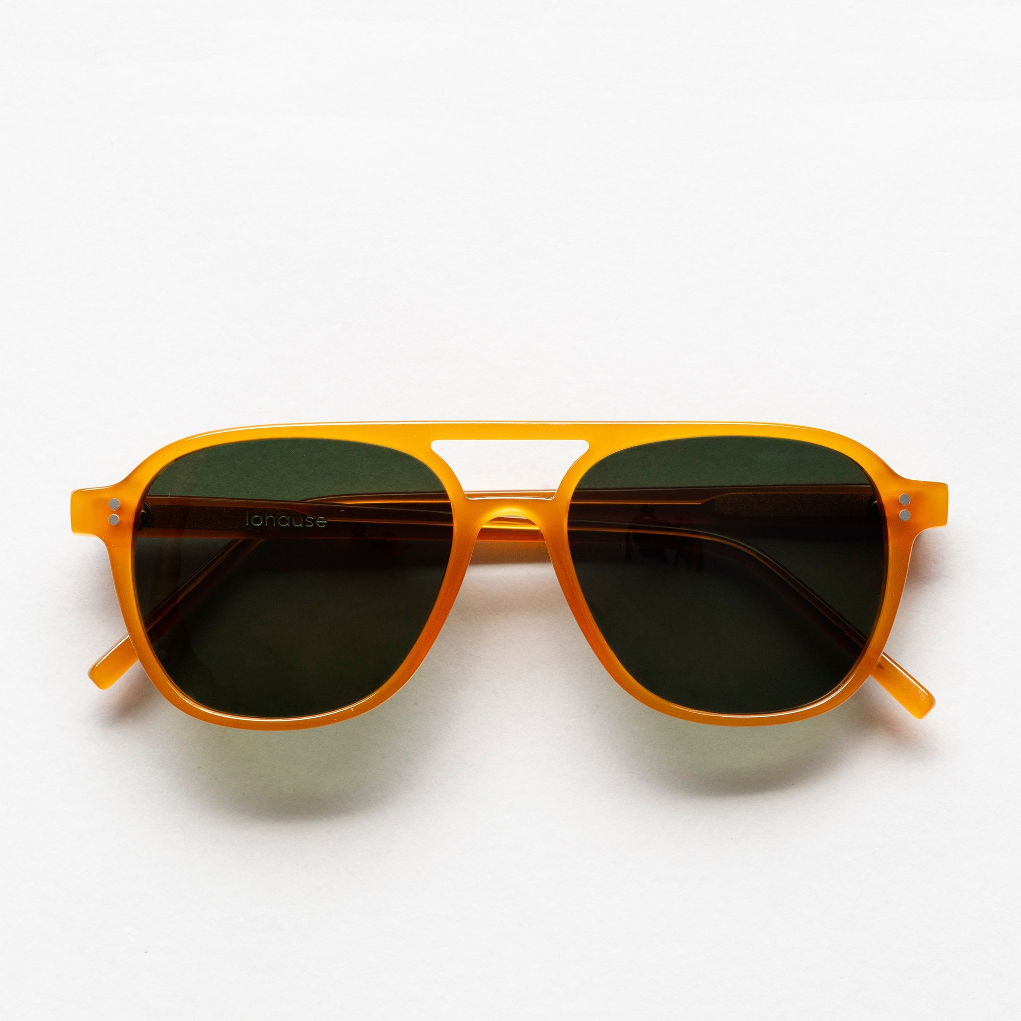 The Truman Amber Sunglasses, Mazzucchelli 1849 acetate frame, aviator shape, in amber.