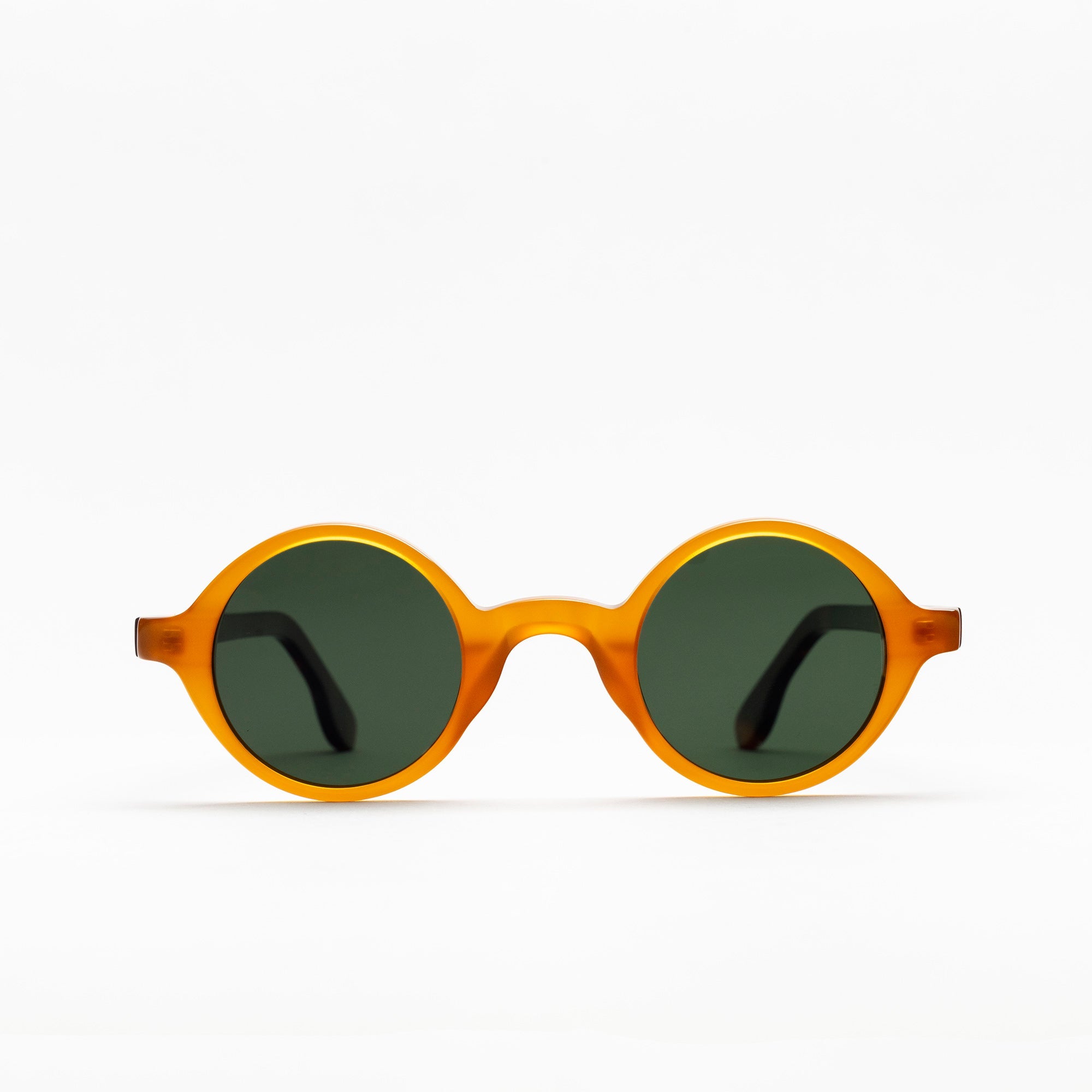 The Winston Amber Sunglasses — sunglasses, Mazzucchelli 1849 acetate frame, round shape, in amber.