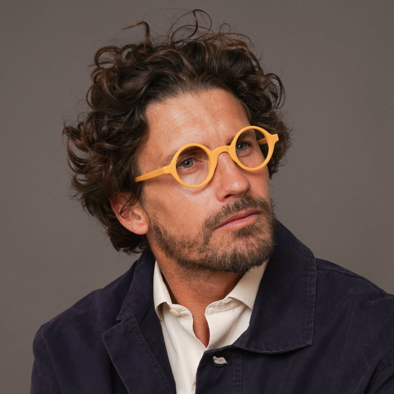 The Winston Amberfort — eyeglasses, Mazzucchelli 1849 acetate frame, round shape, in deep amber.