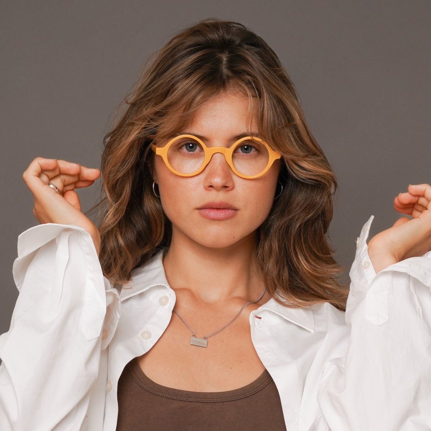 The Winston Amberfort — eyeglasses, Mazzucchelli 1849 acetate frame, round shape, in deep amber.