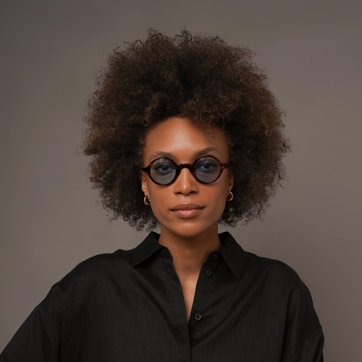 The Winston Bon Vivant, Mazzucchelli 1849 acetate frame, round shape, tortoise with blue-tinted lenses.