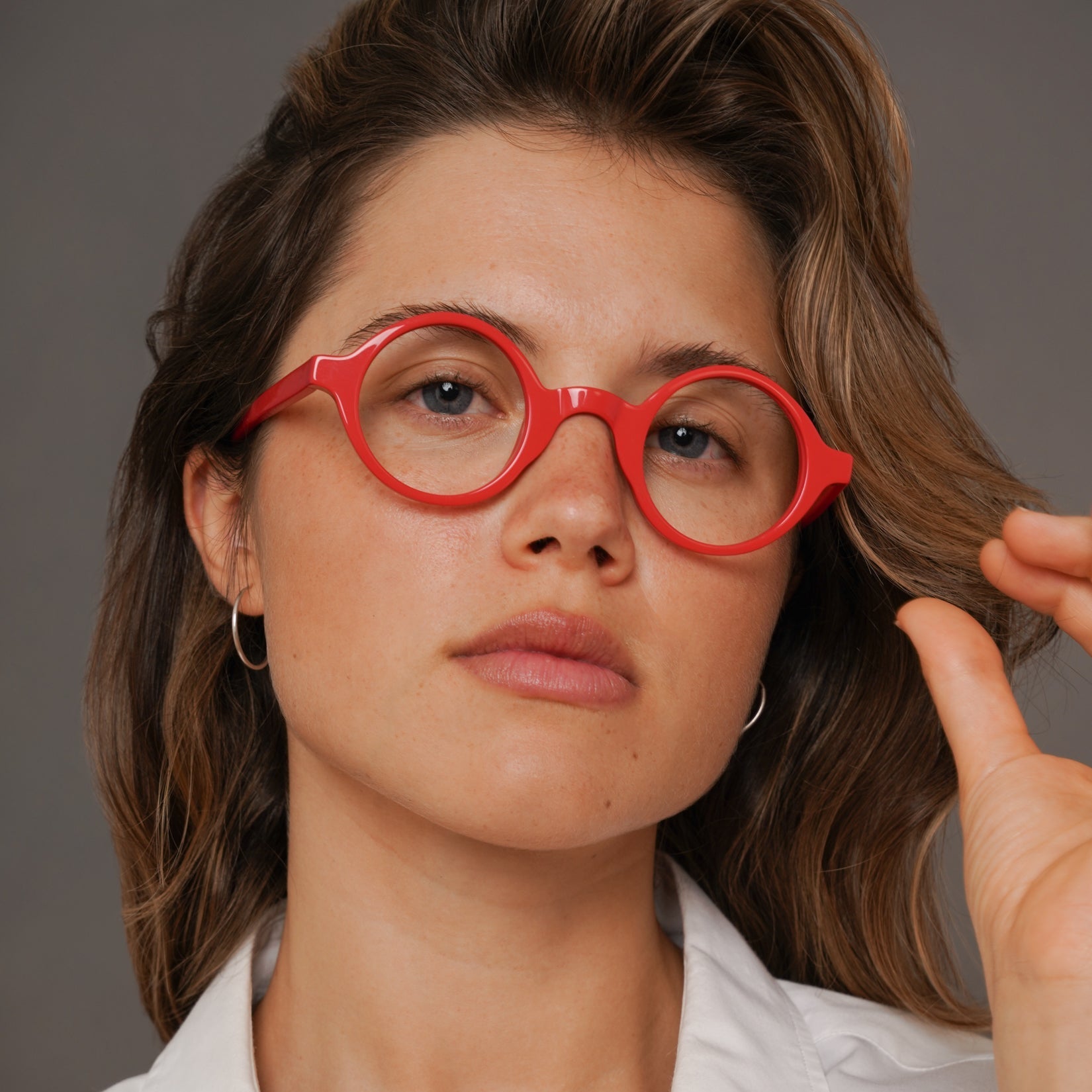 The Winston Carmine — eyeglasses, Mazzucchelli 1849 acetate frame, round shape, in carmine.