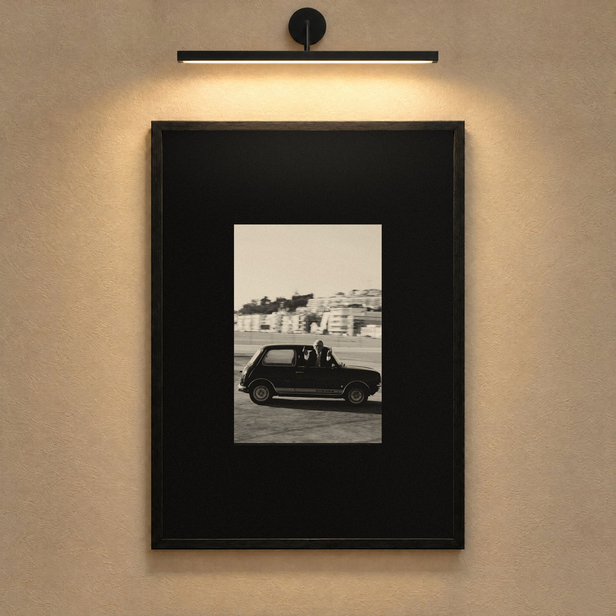 No Hard Feelings by Lohause, framed black and white print under a gallery picture light