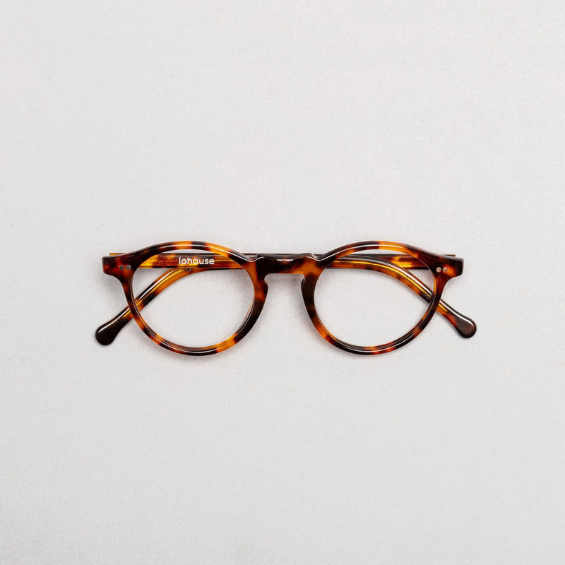 The Redford Tortoise lohause eyewear crafted from italian acetate.